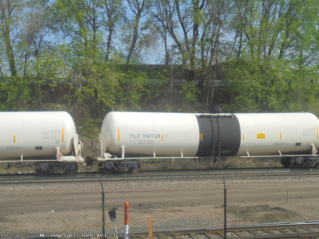 TILX 352728 passes roundhouse